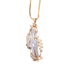 A freshwater cultured pearl, diamond and 14k gold pendant-necklace