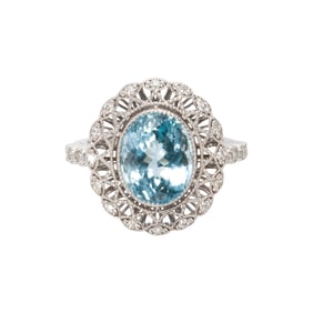 An aquamarine, diamond 14k white gold ring