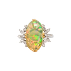 An opal, diamond and 14k white gold ring