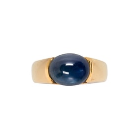 A sapphire and 18k gold ring