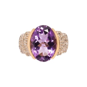 An amethyst, diamond and gold ring
