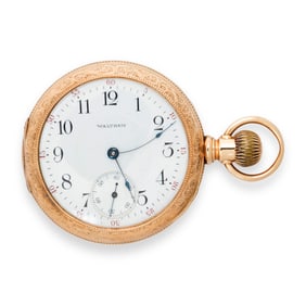 A Waltham 14k gold pocket watch