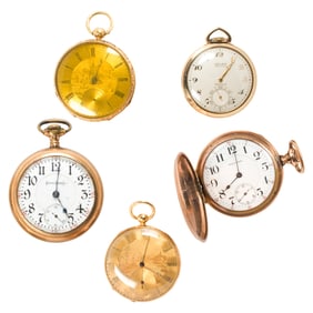 A group of gold-filled pocket watches