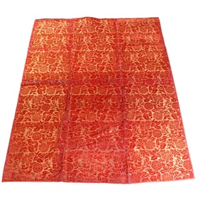 A Chinese red-ground cut-velvet panel
