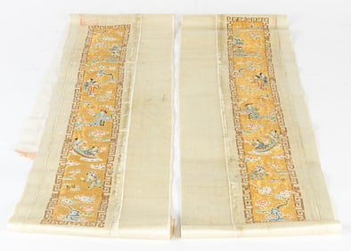 A pair of Chinese embroidered gilt ground sleeve bands