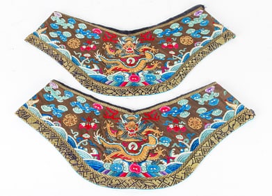 A pair of Chinese embroidered dragon sleeve bands