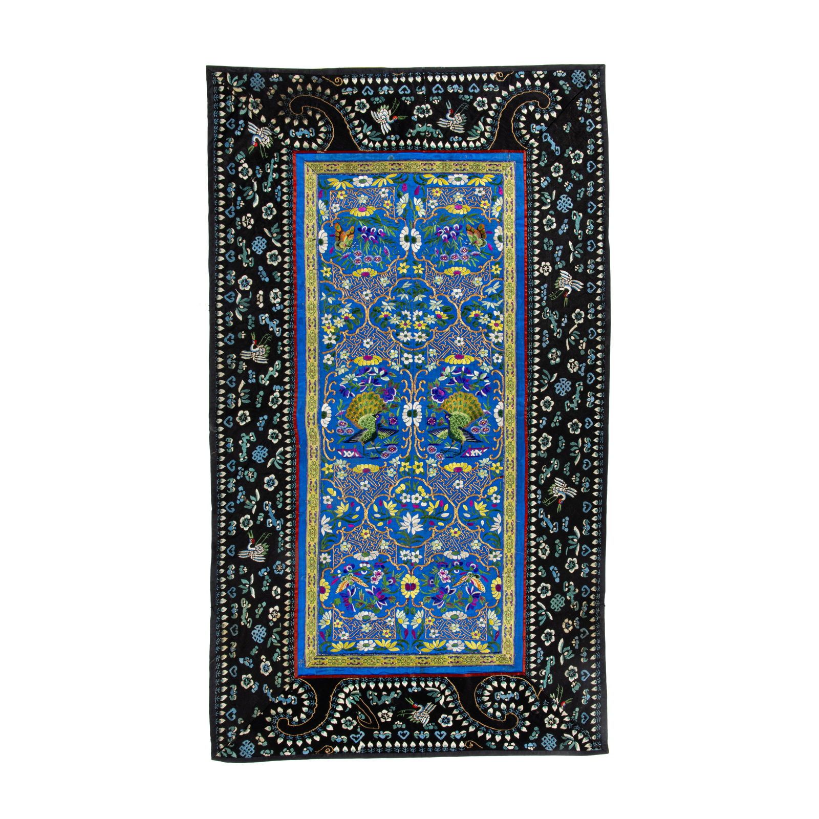 A Chinese embroidered blue ground peacock panel (1 of 3)