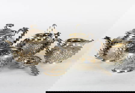 (set of 6) Chinese export silver tea service: (set of 6) Chinese export silver tea service. Comprising a teapot, sugar, creamer, bowl, strainer and a pair of tongs, each decorated with a chrysanthemum motif and marked LW or Luen Wo except for the