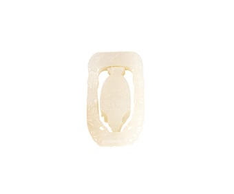 A Chinese white jade revolving pendant