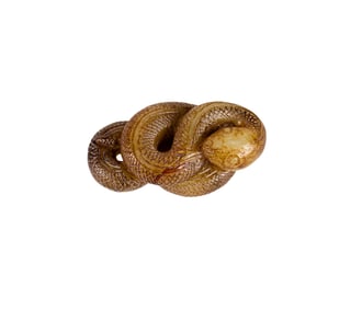 A Chinese russet jade snake toggle