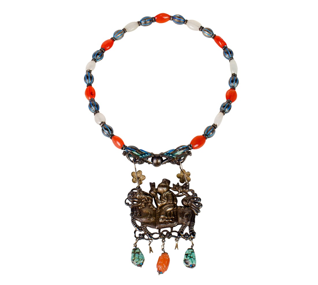 A Chinese silver and glass necklace with a silver pendant: A Chinese silver and glass necklace with a silver pendant. Late Qing dynasty, 22" long approximately. Provenance: Naomi Lindstrom Collection