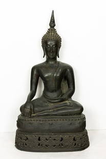 A Thai Bronze Buddha: A Thai Bronze Buddha. Seating on a lotus base in bhumisparsha mudra, 16th century, 30.25" high.