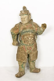 A Chinese polychromed wood standing warrior