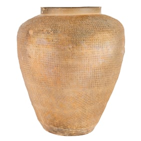 A Chinese pottery jar with impressed textile pattern