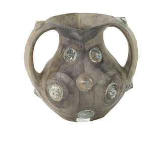 A Chinese Sichuan grey pottery amphora with bronze boss appliques