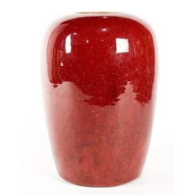 A Chinese flambe glazed covered jar