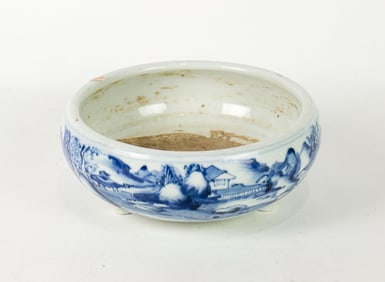 A Chinese blue and white tripod censer