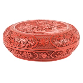 A Chinese finely carved cinnabar lacquer circular box and cover