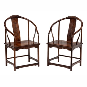 A pair of Chinese huanghuali horseshoe-back armchairs