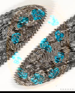 A Native American, sterling silver, and turquoise belt buckle: A Native American, sterling silver, and turquoise belt buckleOf figurative design, featuring turquoise pieces; 58.17 grams; 3 1/4 x 2 1/4 inches;