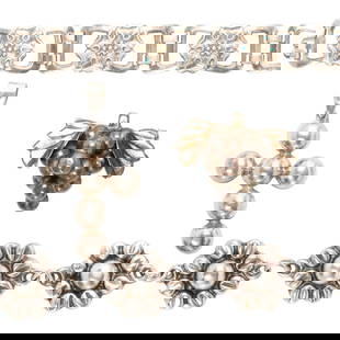 A group of silver jewelry: A group of silver jewelrycomprising two bracelets, lengths of 7 in, one cross pendant, and one pin of grape-leaf design; gross grams: 53.16 grams