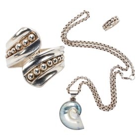 A group of silver jewelry