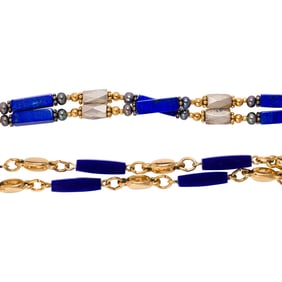 A pair of lapis and gold bead necklaces