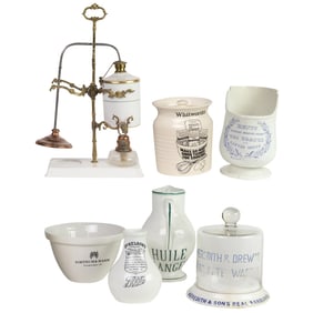 A group of advertising ceramics and kitchen tools