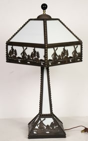 An Art & Crafts style glass and patinated metal table lamp