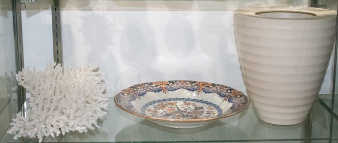 An assembled group of coral and ceramic articles including delft