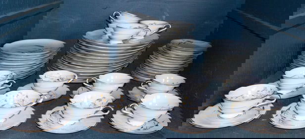 A sixty-piece Bavarian porcelain dinner service E&R 'Golden Harvest' pattern