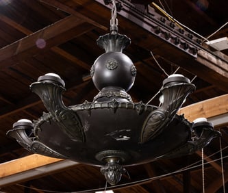A vintage French Empire style patinated metal five-light chandlier