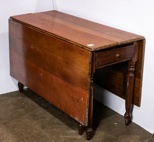 A Federal style cherry drop leaf table