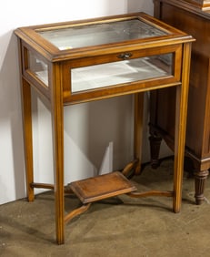 A silk lined presentation table vitrine