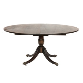 A Regency style mahogany dining table