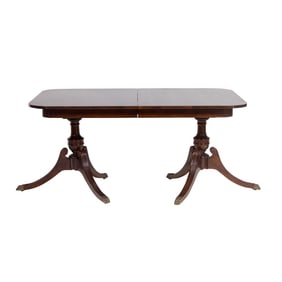 A Regency style mahogany double pedestal dining table