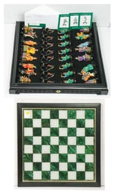 A Franklin Mint 'Emperors of the Orient' chess set with board