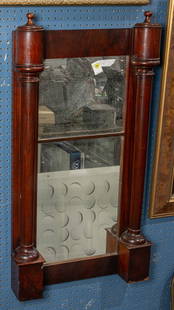 An English mahogany mirror: An English mahogany mirror, mid-19th century, the rectangular mirror plate flanked by columns, 41.5?h x 22?w