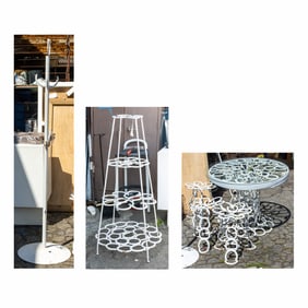 A six-piece group of vintage horseshoe patio furniture items