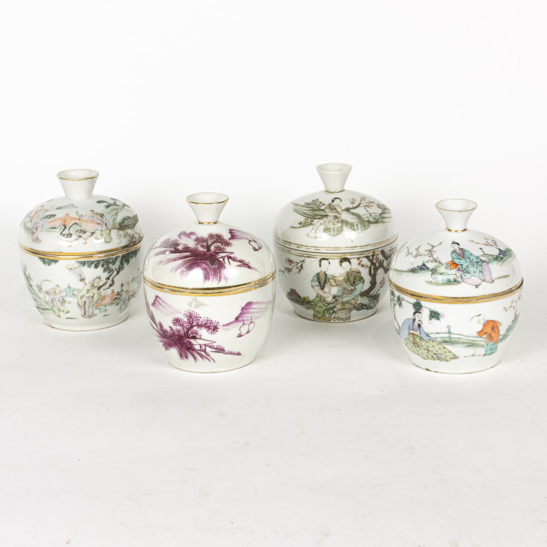 (lot of 4) Chinese famille rose covered bowls: (lot of 4) Chinese famille rose covered bowls. Featuring landscape, calligraphy, and figural motifs, 5" tallest.