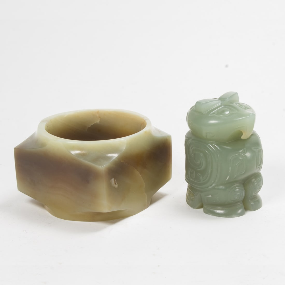 (lot of 2) Chinese jade carvings: (lot of 2) Chinese jade carvings. From 2" to 2.125" across.