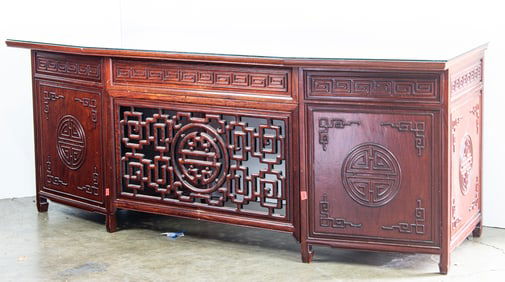 A Chinese hardwood kneehole desk