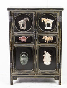 A Chinese soapstone inlaid lacquered chest