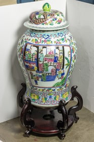 A Chinese famille rose covered jar with stand