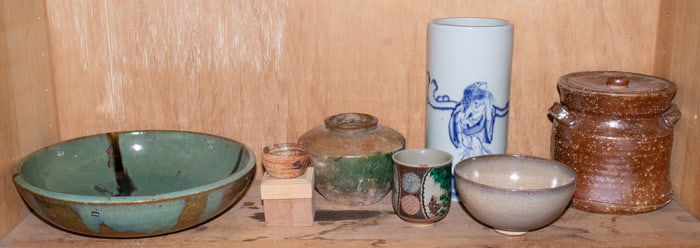 A shelf of Japanese ceramic articles