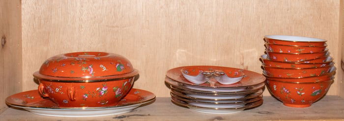 A group of Chinese famille rose coral-ground dinner service