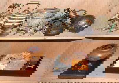 A Shelf of Asian decorative metal articles