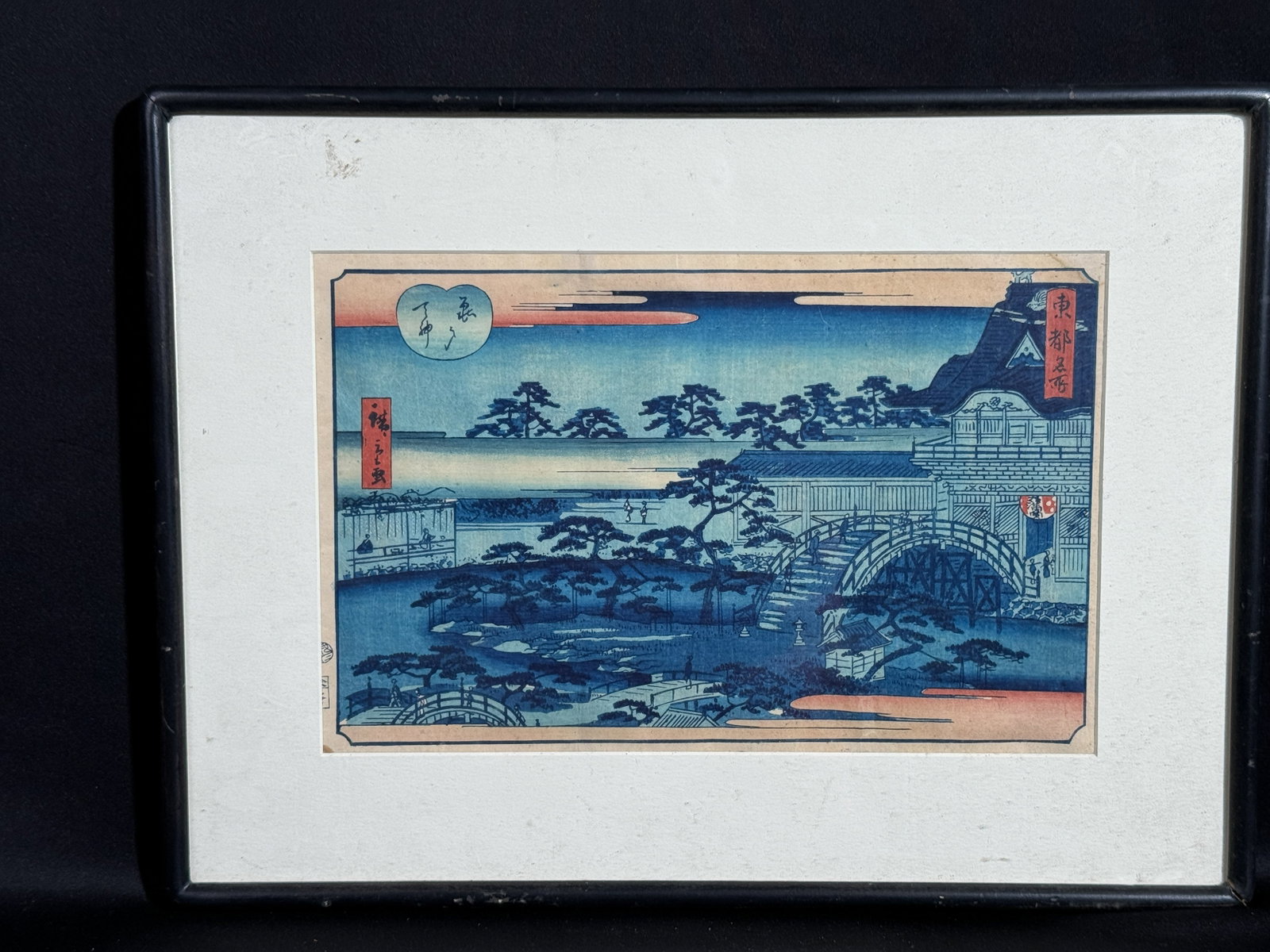 Hiroshige Utagawa (Japanese 1797-1858), Woodblock Print with Tokyo Scene: Japanese woodblock print by Hiroshige Utagawa with Tokyo scene. Image: 14"h x 9"w (35.56 x 22.86 cm); with frame: 19.5"h x 14.5"w (49.53 x 36.83 cm) Provenance: From a single private collection in Con