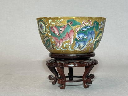Chinese Porcelain Bowl with Famille Rose Foolions : Chinese gilted porcelain ground with famille rose porcelain foolion scene, underglazed blue mark, sit on hardwood stand. Porcelain part: 3"h x 6.5"dia (7.62 x 16.51cm) Provenance: From a single privat