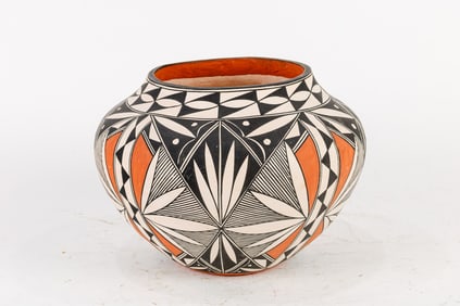 An Acoma Pueblo polychrome pottery vessel signed A. Concho